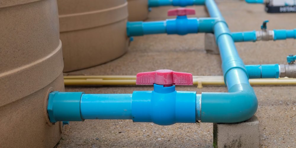 blue-water-pipe-installation-from-pump-to-tank-PTWBDHL