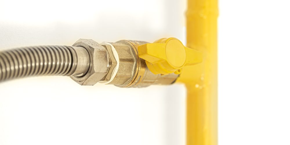 yellow-gas-pipe-with-a-valve-white-background-9ALDFU2